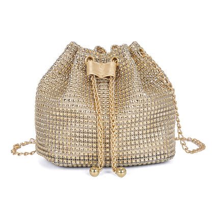 Celeste crystal bucket bag in gold