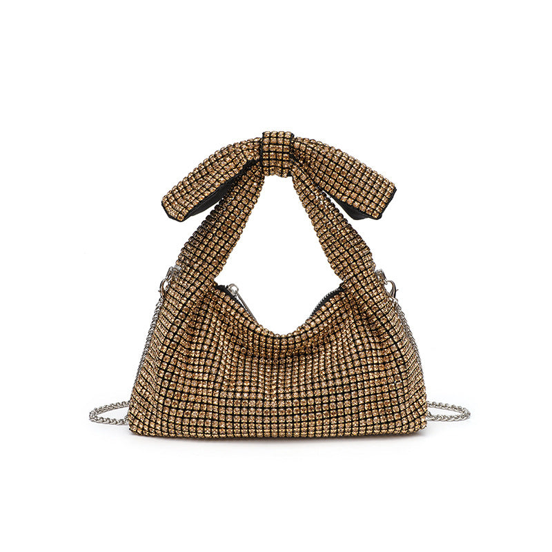 Papillon crystal bow bag in gold