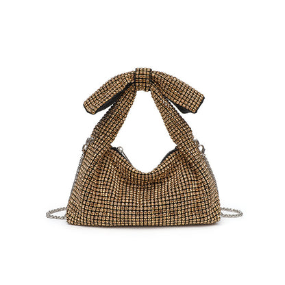 Papillon crystal bow bag in gold