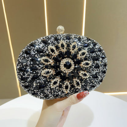 Soleil crystal sunflower clutch in black